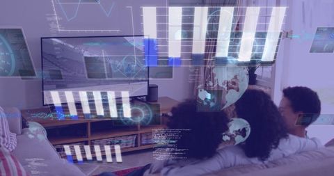 Family Analyzing Sports Data Visualizations at Home