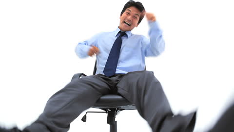 Dynamic Businessman Swinging on Chair in Exciting Office Moment