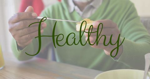 Healthy Lifestyle Concept with Man Eating Breakfast