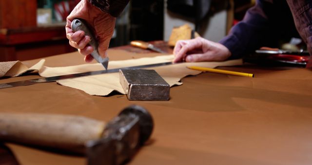 Close-Up of Artisan Cutting Leather with Precision Knife - Download Free Stock Images Pikwizard.com