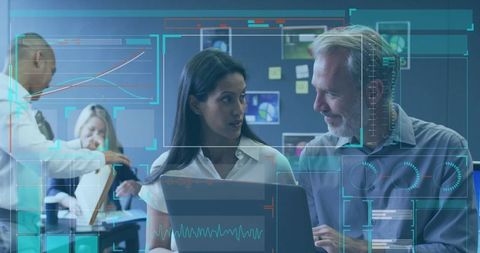 Modern office data visualization with diverse team collaborating