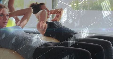 Women performing core crunches on padded benches with futuristic fitness data overlay
