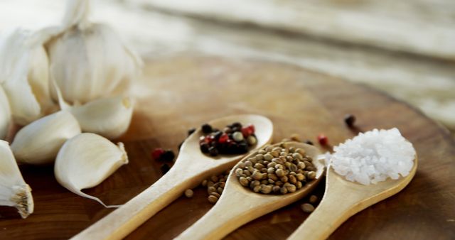 Close-Up of Garlic and Various Spices on Wooden Board - Download Free Stock Images Pikwizard.com