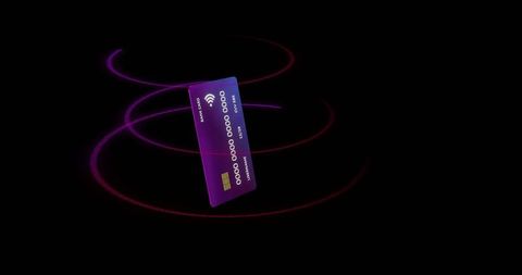 Floating neon contactless credit card with spiral light trails on dark tech background