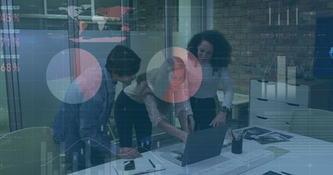 Business team analyzing data with advanced digital interface