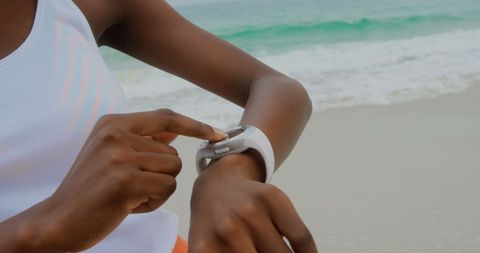 Person Interacting with Smartwatch by Beachside - Download Free Stock Images Pikwizard.com