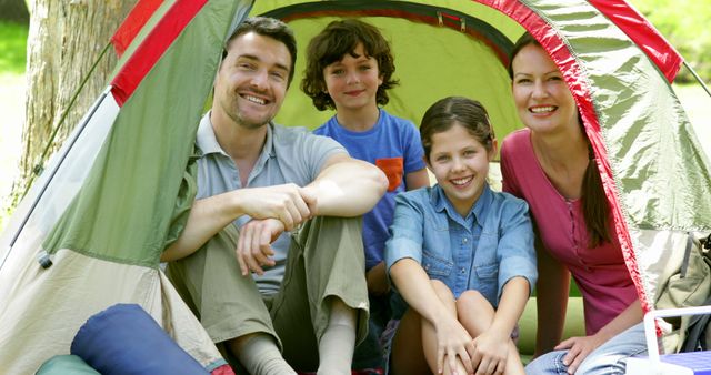 Happy Family Camping Together in Tent in Park - Download Free Stock Images Pikwizard.com