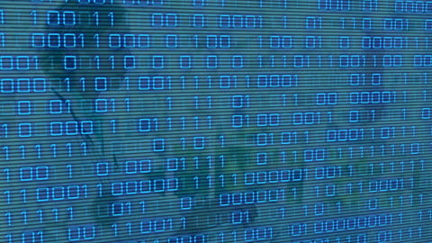 Abstract Binary Code with Woman in Medical Setting