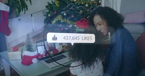 Mother and child video calling with festive holiday decorations