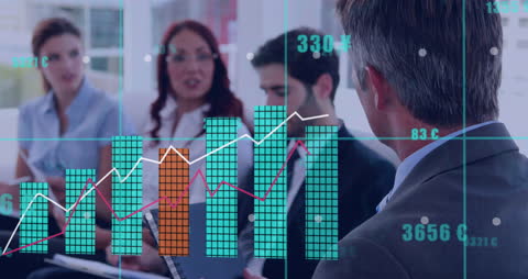 Diverse Business Team Analyzing Financial Graphs in Office Environment