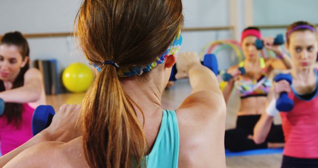 Women Exercising in Fitness Class with Free Weights - Download Free Stock Images Pikwizard.com