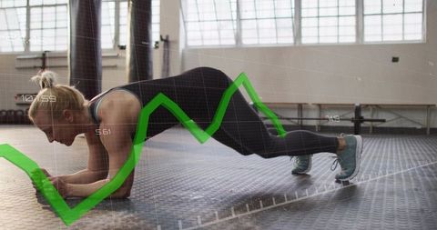 Female athlete holding plank and bracing core in sunlit gym with green performance graph