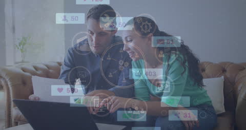 Smiling Couple Engaging with Social Media Analytics Icons