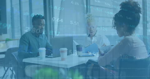 Diverse Team Analyzing Financial Growth With Data Overlay in Modern Office