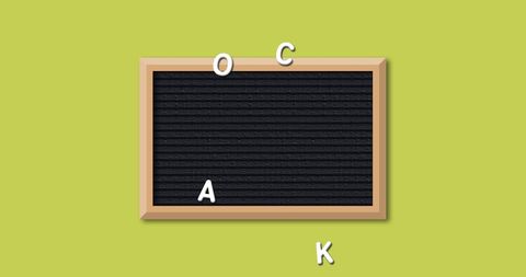 Blank chalkboard with alphabet letters on yellow background