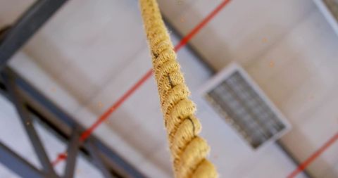 Sisal rope hanging in industrial gym environment