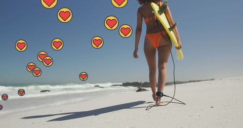 Woman Holding Surfboard on Beach with Heart Icons
