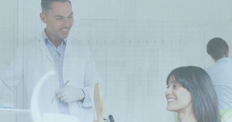 Dentist Guiding Patient Inspecting Teeth at Modern Clinic
