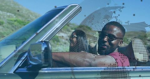 Man enjoying scenic road trip in convertible