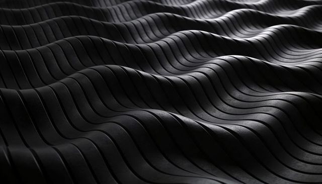 Matte Black Wavy Rubber Surface with Parallel Grooves and Soft Upper-Right Highlights
