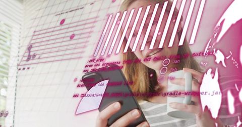 Smiling woman using smartphone and coffee mug in bright home office with tech overlay