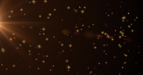 golden stars glittering on dark background for festive celebration - Download Free Stock Images Pikwizard.com