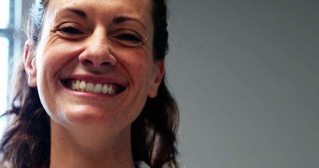 Close-up of smiling woman with joyful expression - Download Free Stock Images Pikwizard.com