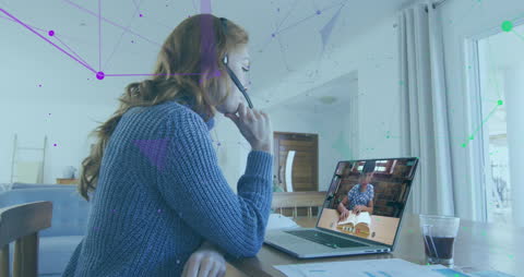 Businesswoman in Virtual Meeting with Digital Data Visualization
