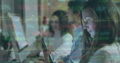 Diverse Business Team Analyzing Real-Time Stock Market Data