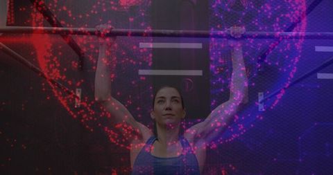 Woman performing pull-up with neon red and purple light overlay for fitness branding campaign