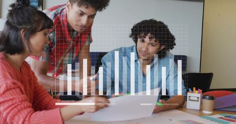 Colleagues Discuss Financial Data Visualization in Modern Office