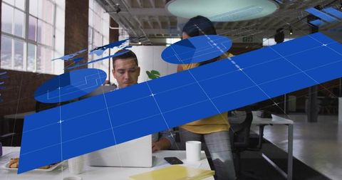 Team collaborating with holographic data overlays over laptop in modern open-plan office