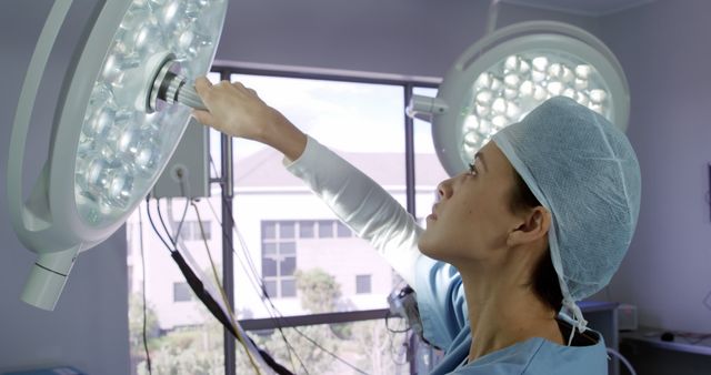 Surgeon Adjusting Operating Room Light - Download Free Stock Images Pikwizard.com