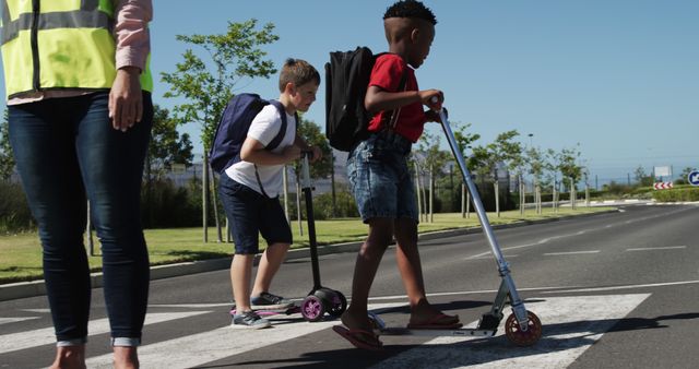 Children Riding Scooters and Crossing Street - Download Free Stock Images Pikwizard.com