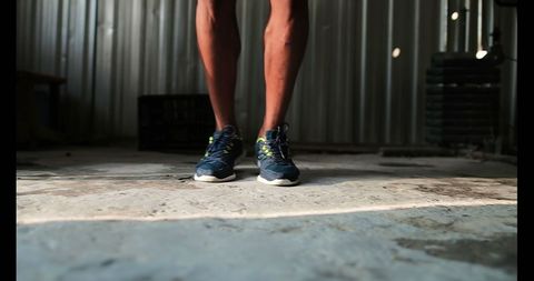 Athletic Male Skipping Rope in Fitness Studio