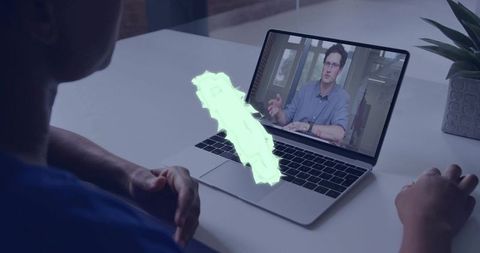 Virtual Collaboration: African American Professional in Online Meeting