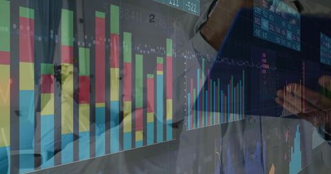 Business Team Analyzing Interactive Financial Dashboards on Tablet for Data Visualization