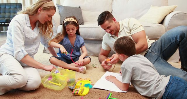 Parents and Children Engaging in Creative Family Activity at Home - Download Free Stock Images Pikwizard.com