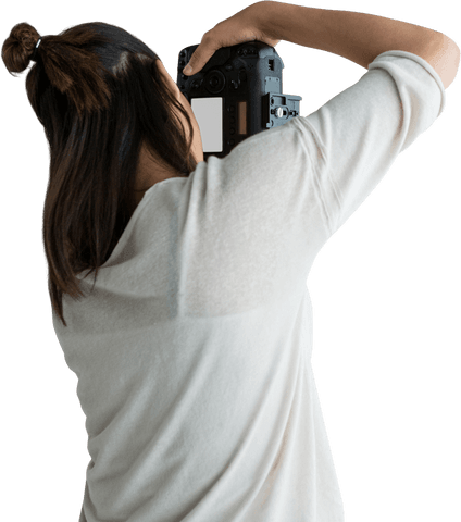 Transparent view female photographer with camera ready to shoot