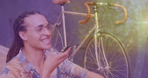 Happy Man Using Smartphone Near Bicycle