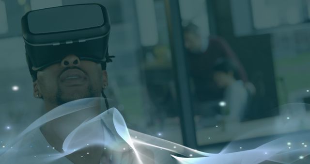 Man Experiencing Virtual Reality with Futuristic Digital Elements - Download Free Stock Images Pikwizard.com