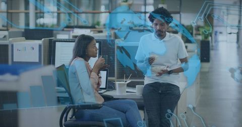 Diverse Colleagues Discussing Business Strategy in Modern Office