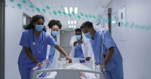 Medical Team Transporting Patient Through Hospital Corridor