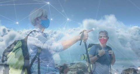 Senior Couple Hiking with Digital Network Concept