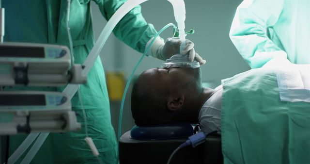 Patient on Operating Table with Ventilator Support During Surgery - Download Free Stock Images Pikwizard.com