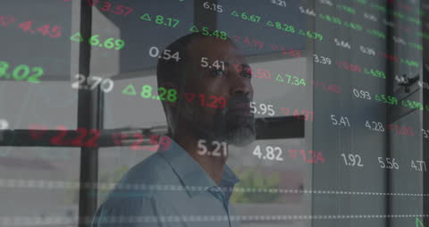 Businessman Analyzing Stock Data with Reflective Mood