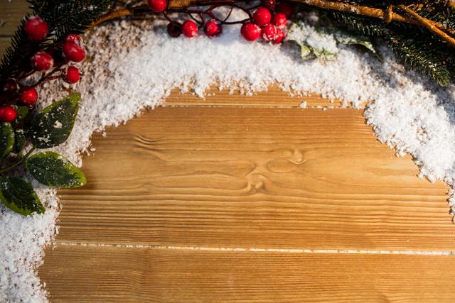 Close-up of christmas decorations on wooden plank during christmas time