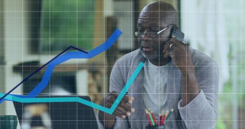 African American Businessman Analyzing Financial Data Trends - Download Free Stock Images Pikwizard.com