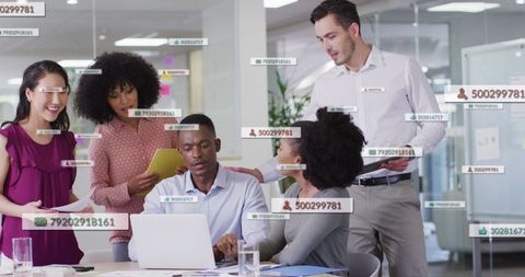 Diverse Team Engaging With Data in Modern Office Environment