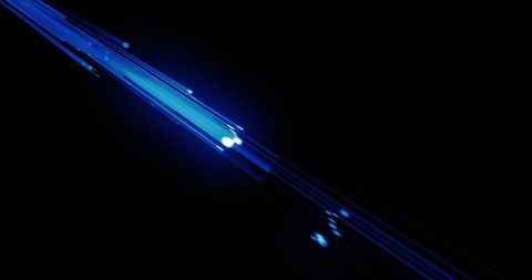 Futuristic blue light trails on black background